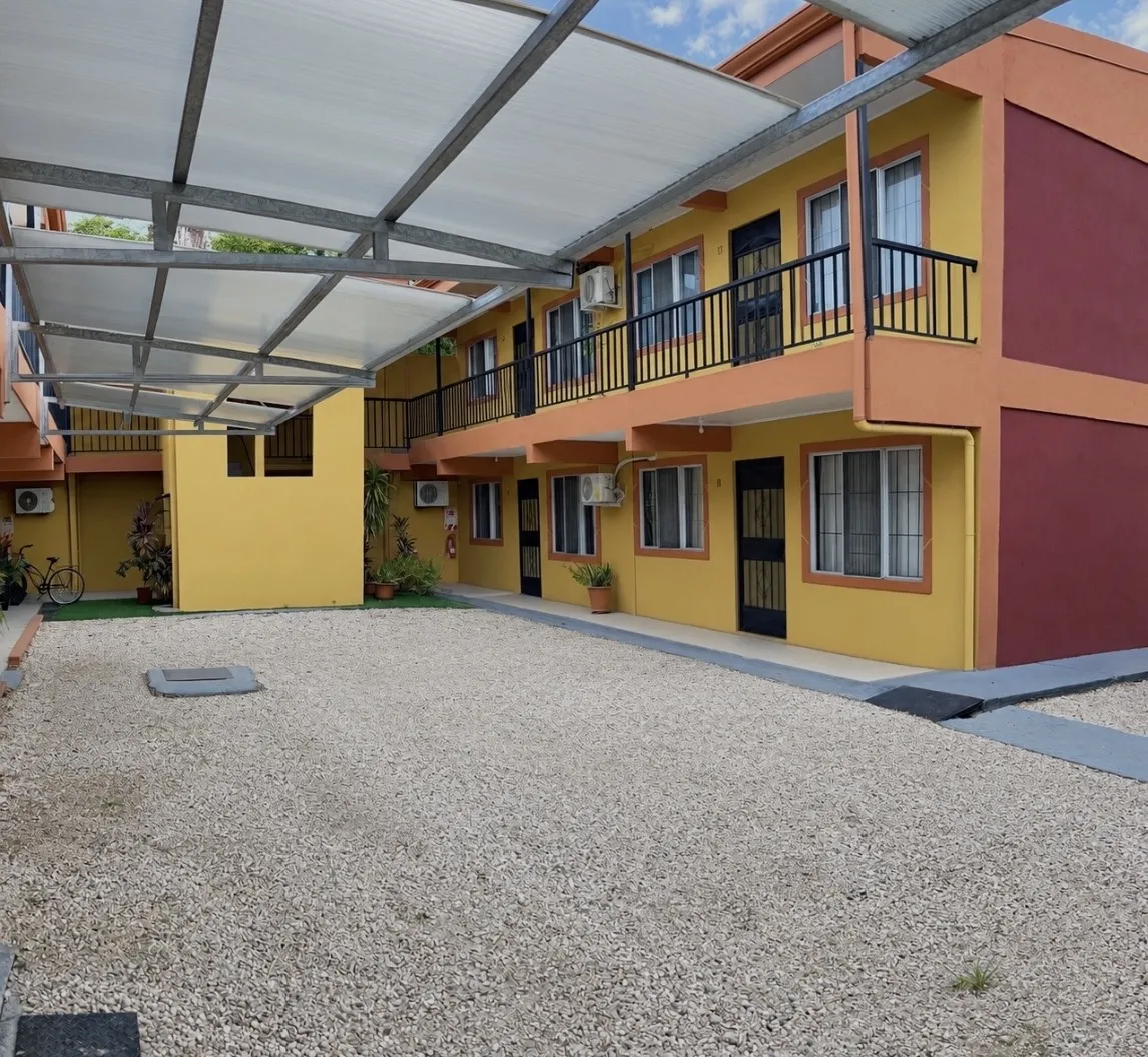 Two-storey apartment buildings around the courtyard